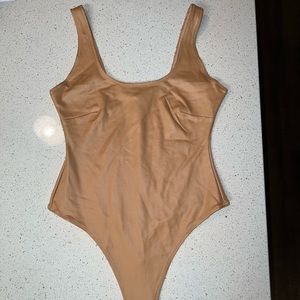 SKIMS WET JERSEY BODYSUIT OCHRE